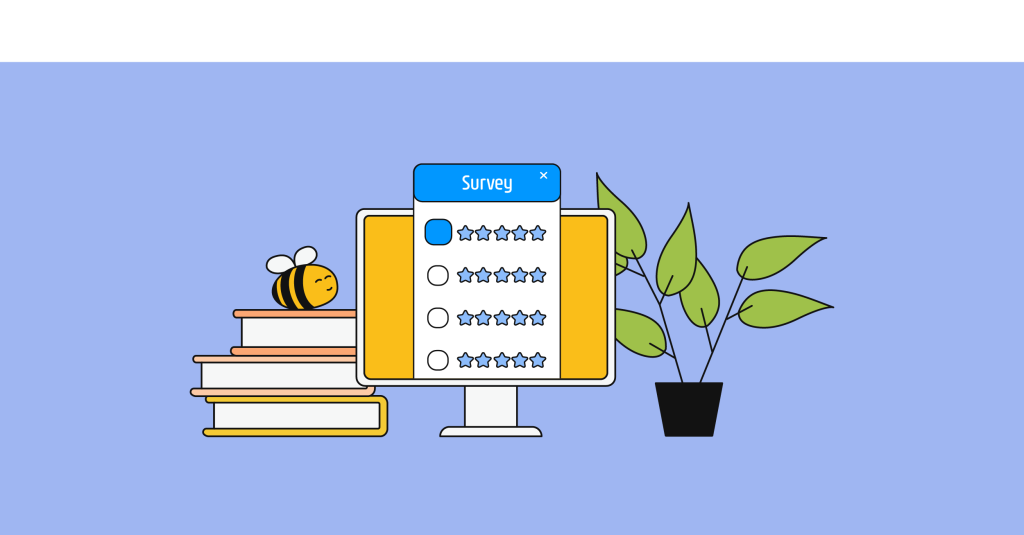 écran d'ordinateur avec un livre sur le côté, abeille et plante en arrière-plan