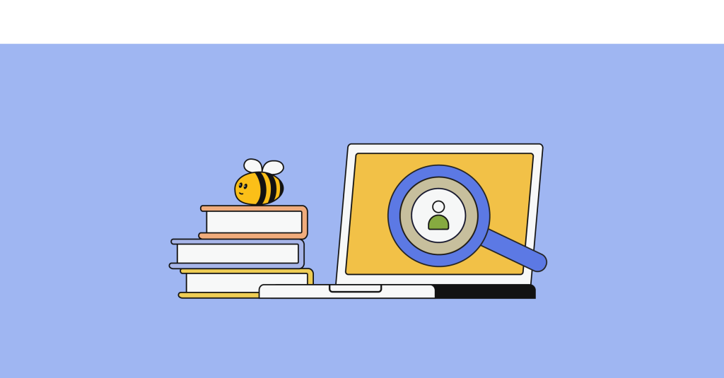 laptop e uma pilha de livros