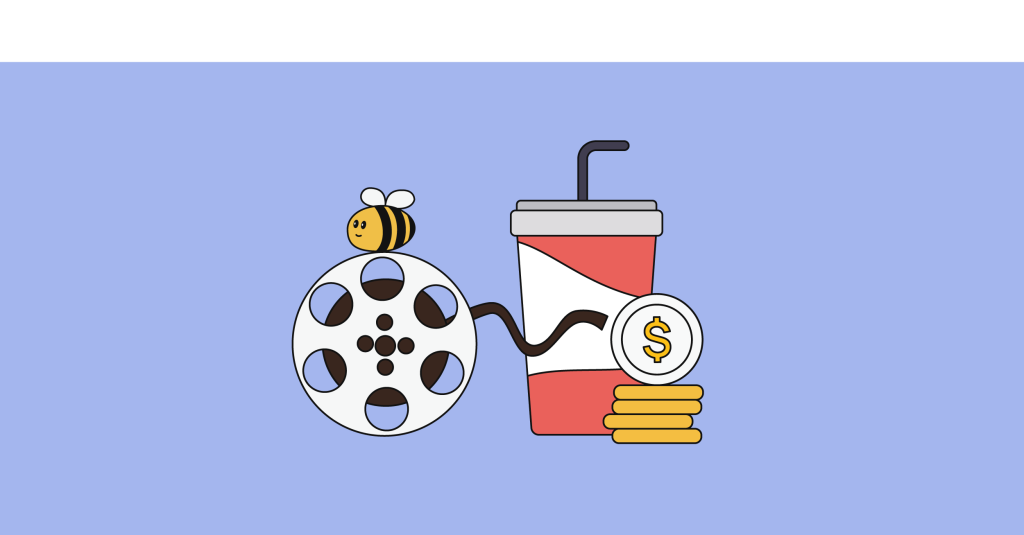 cinta de cine y una taza de bebida