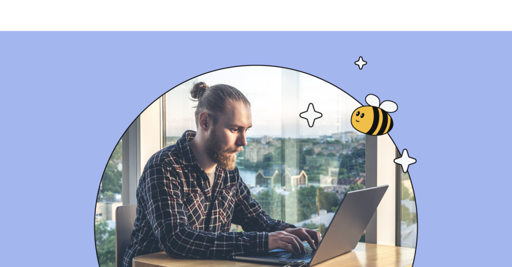 man sitting by the laptop